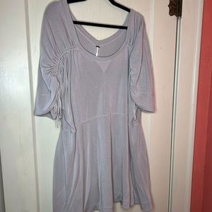 Light grey Free people dress with pockets. Size L. Small flaw on back by label.